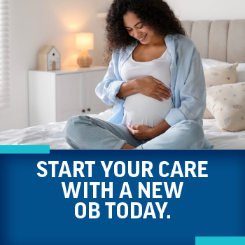 Pregnant woman holding her belly over text