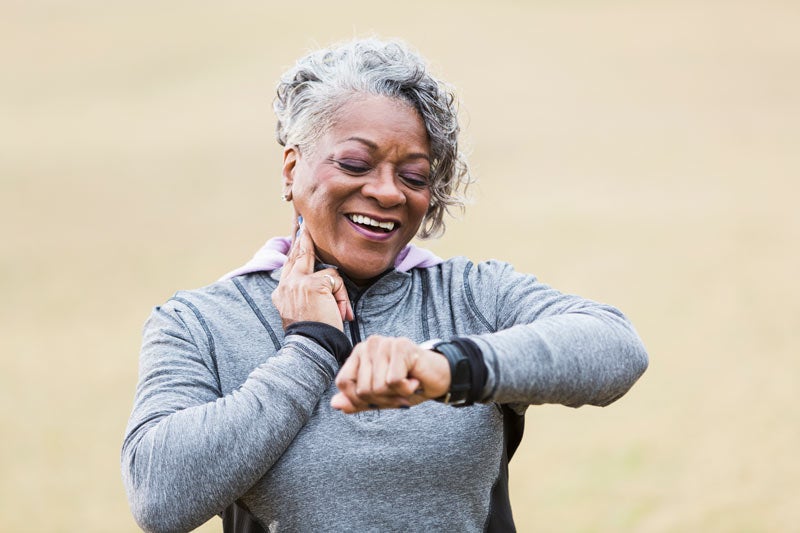 Woman checking her heart rate